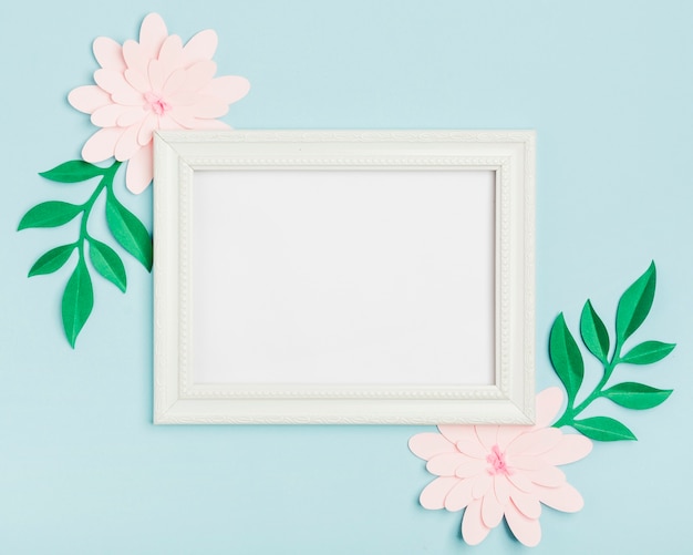 Top view of paper spring flowers with frame