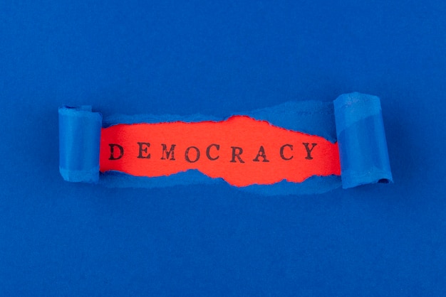 Free photo top view paper style democracy composition