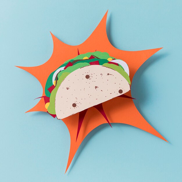 Top view paper taco on blue background