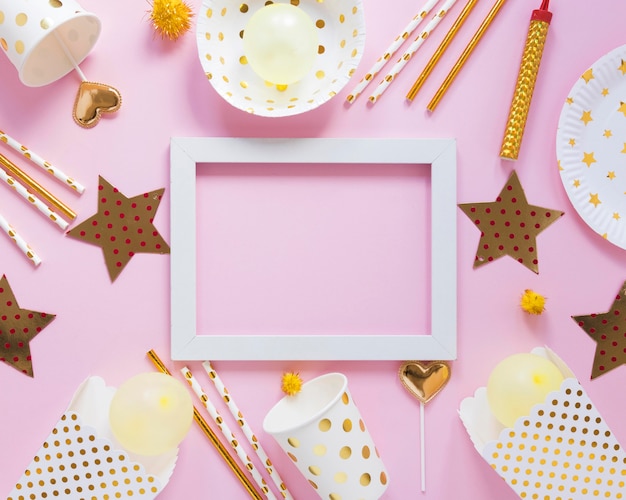 Top view party items with white frame