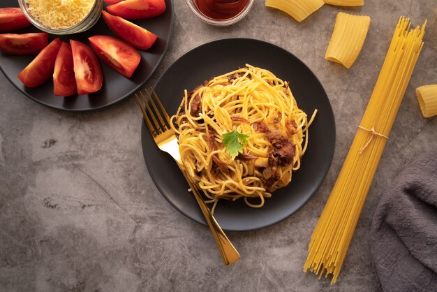 Top view pasta dish with tomatoes