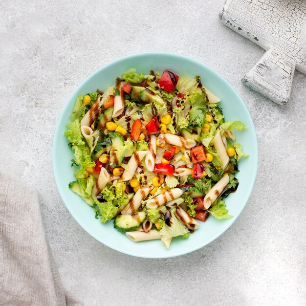 Top view pasta salad with balsamic vinegar