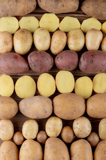 Free photo top view of pattern of sliced and whole potato