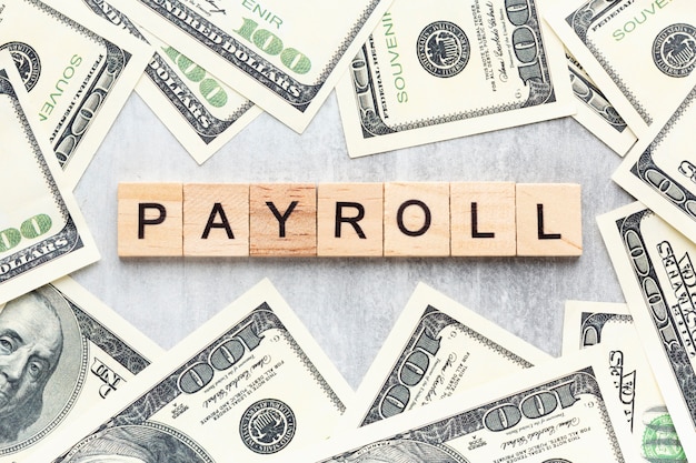 Top view payroll concept with banknotes