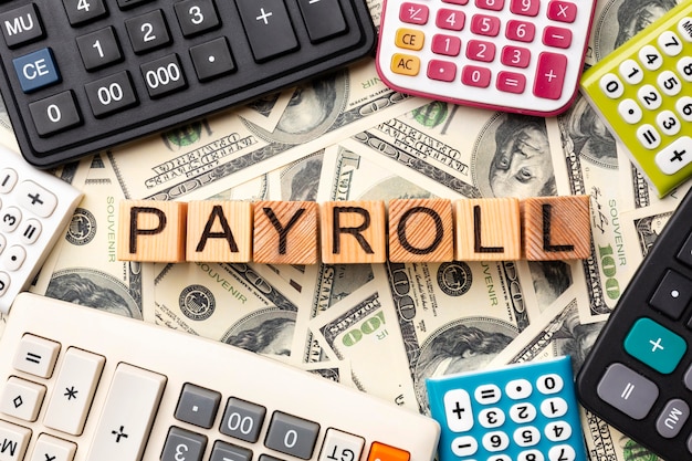 Top view payroll concept with cash