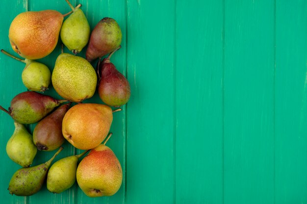 Top view of peaches on green surface