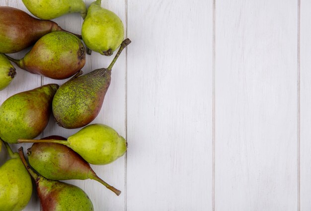 Top view of peaches on left side and wooden surface