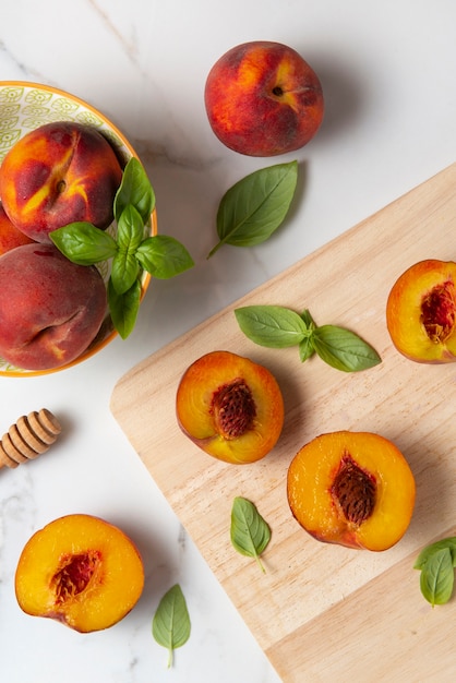 Top view peaches on wooden board