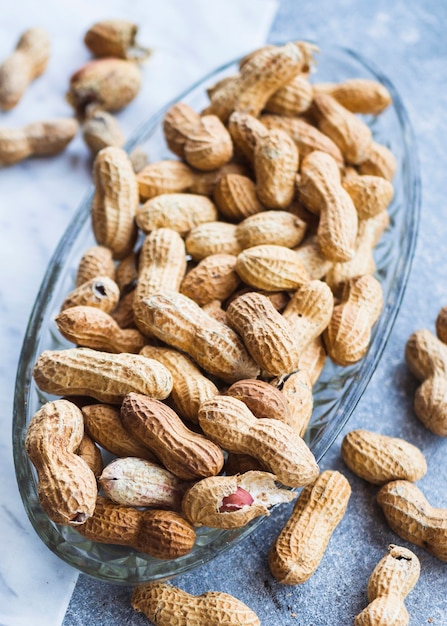 Top view of peanuts seed in the glass bowl