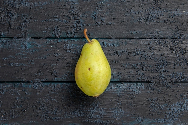 Top view pear on table green pear on grey table