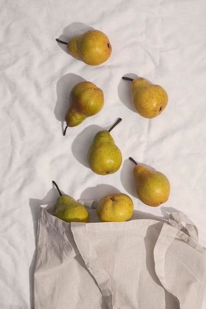 Free photo top view  pears arrangement with bag