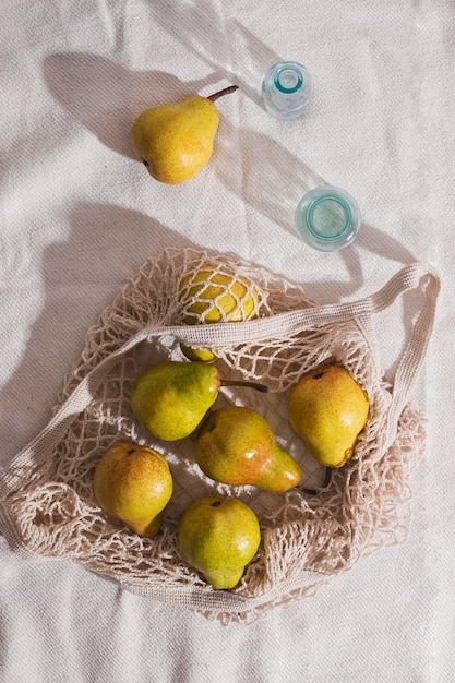 Top view pears on net bag arrangement