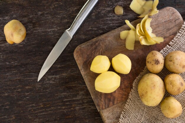 Top view peeled potatoes arrangement