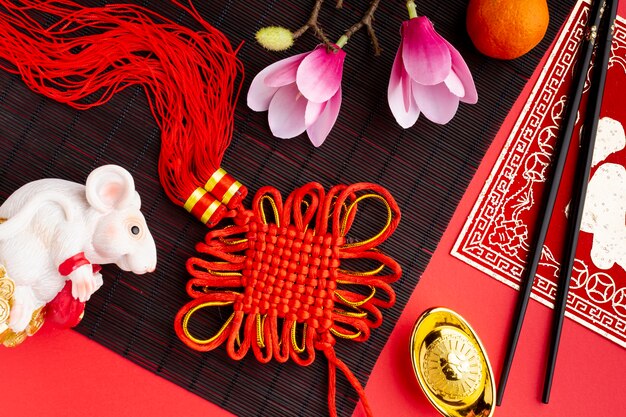 Top view of pendant and rat figurine chinese new year