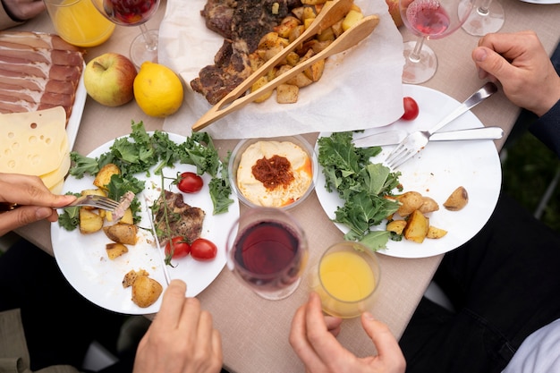 Top view people eating together