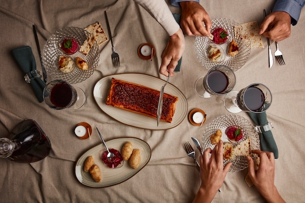 Free photo top view of people having a feast for the first day of passover seder