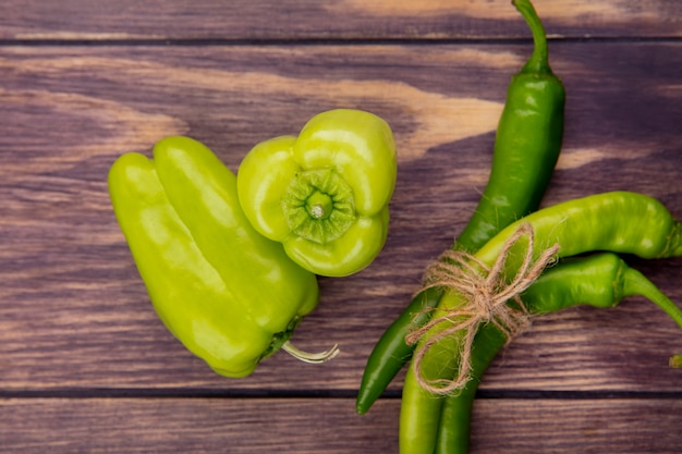 Top view of peppers on wooden surface