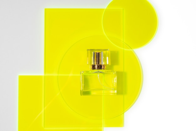 Top view perfume bottle and geometric shapes