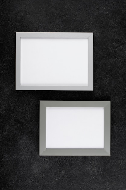 Free photo top view of photo frames on textured surface