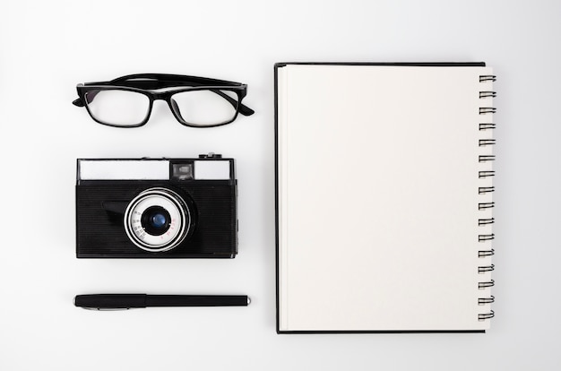 Top view photograph desk with camera