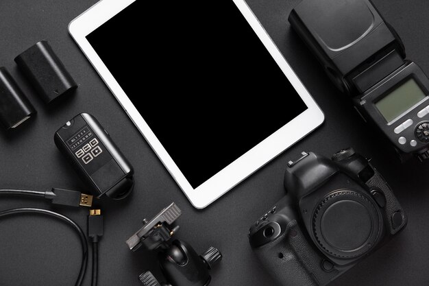 Top view of photography accesories and tablet