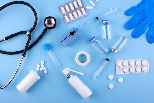 Top view pills and stethoscope arrangement