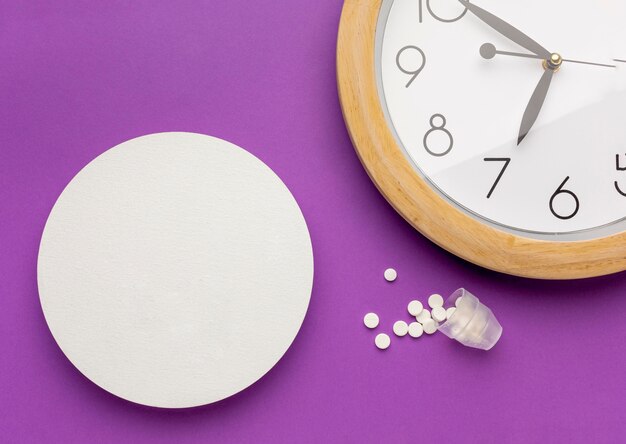 Top view pills with clock