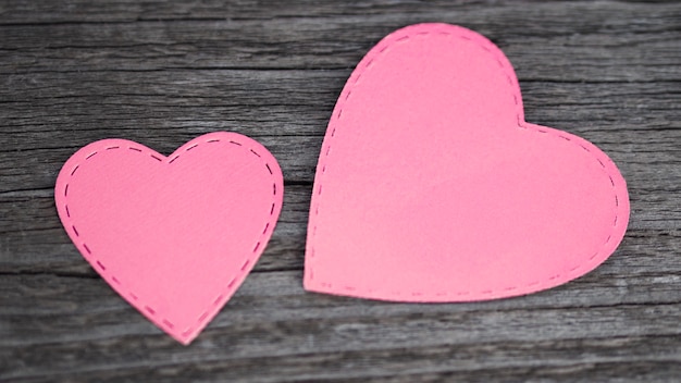 Top view pink hearts on table