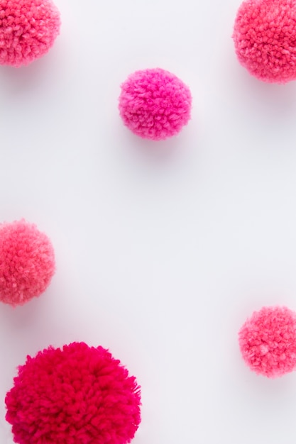 Top view pink pom poms arrangement