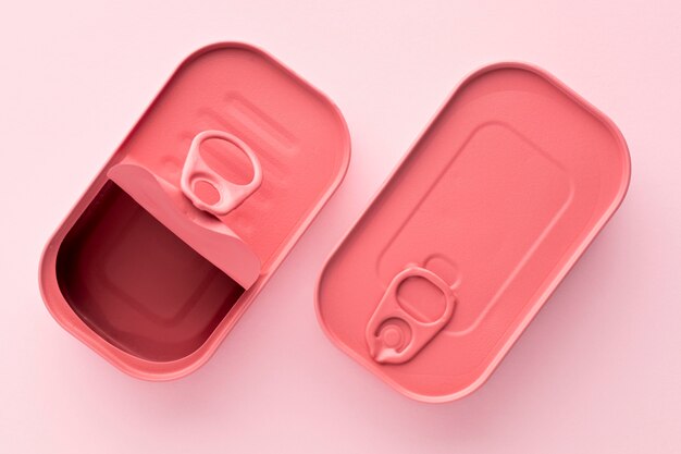 Top view pink rounded rectabgle tin cans