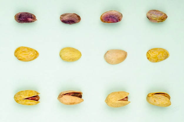 Top view of pistachio nuts isolated on a white background