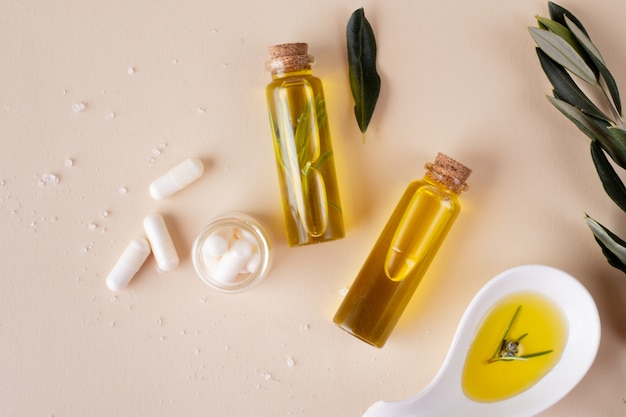 Top view plastic bottles with oil and pills