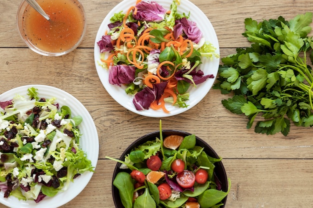 Top view plate with salad on table