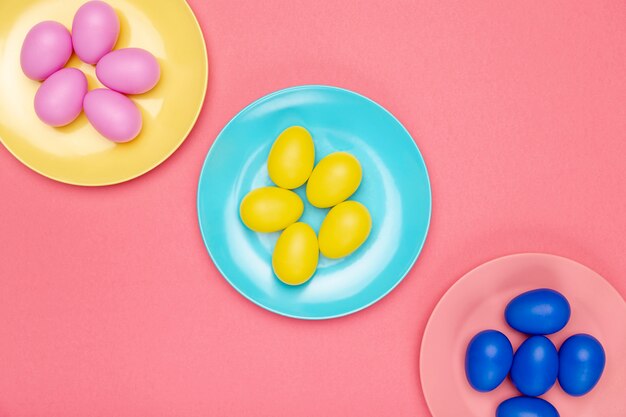 Top view plates with colored eggs