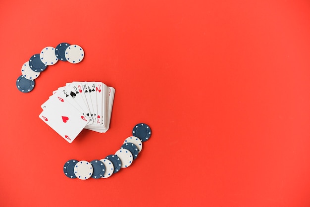 Top view playing cards with poker chips