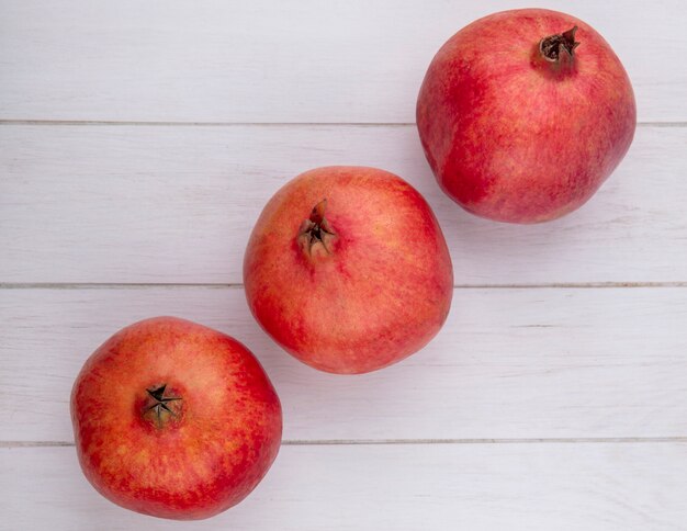 Top view of pomegranate on a white surface