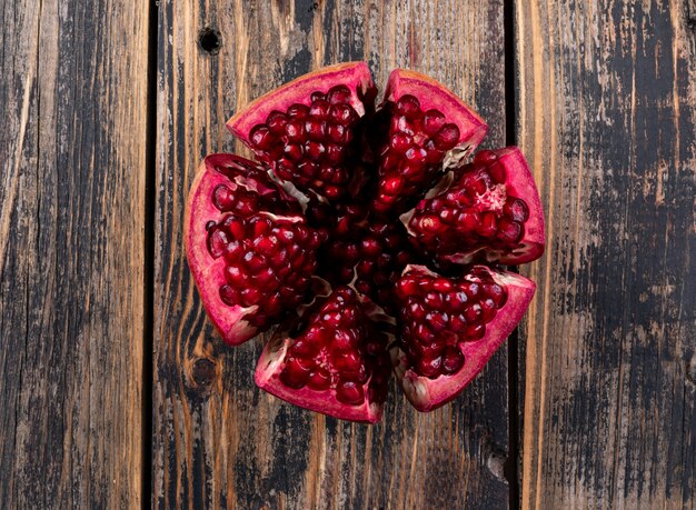 top view pomegranate on wooden table