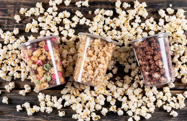 Top view of popcorn on dark wooden  horizontal