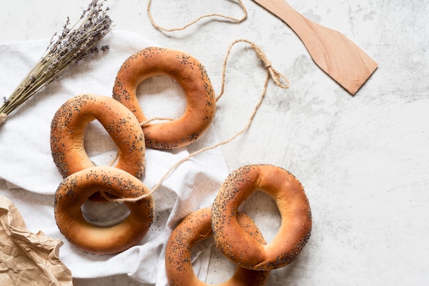 Top view poppy seed bagels with string