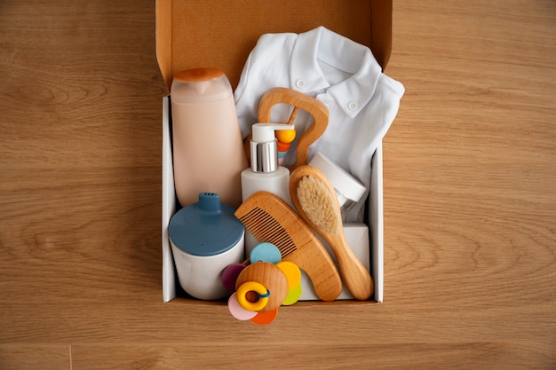 Free photo top view postpartum  box still life