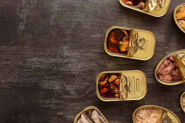 Top view preserved food cans with copy-space