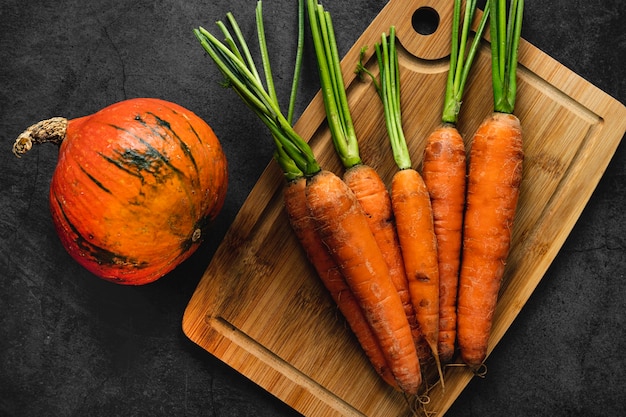 Top view pumpkin and carrots