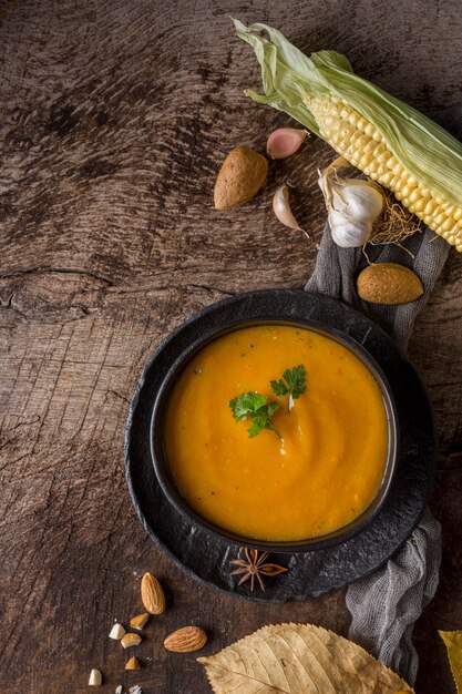 Top view pumpkin cream soup in bowl