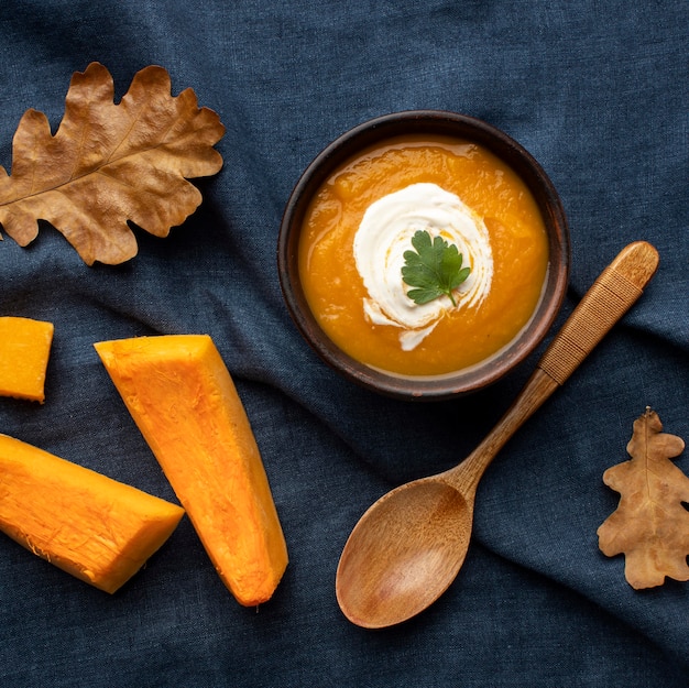 Top view pumpkin soup autumn food concept