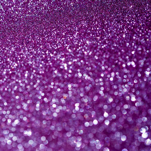 Top view purple glitter background close-up