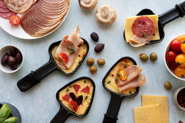 Top view of raclette dish with ingredients and delicious food
