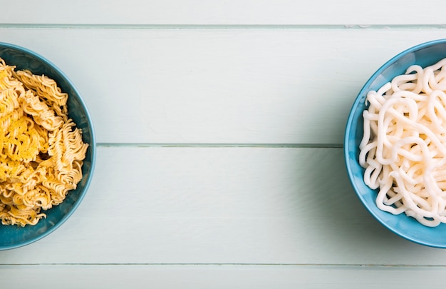 Top view ramen in bowls with copy space