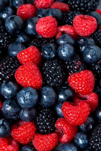 Top view raspberries, blackberries and blueberries