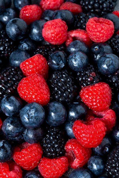 Top view raspberries, blackberries and blueberries