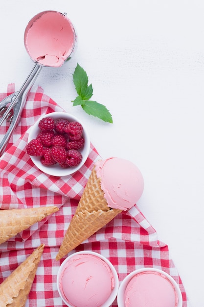 Top view of raspberries ice cream cones